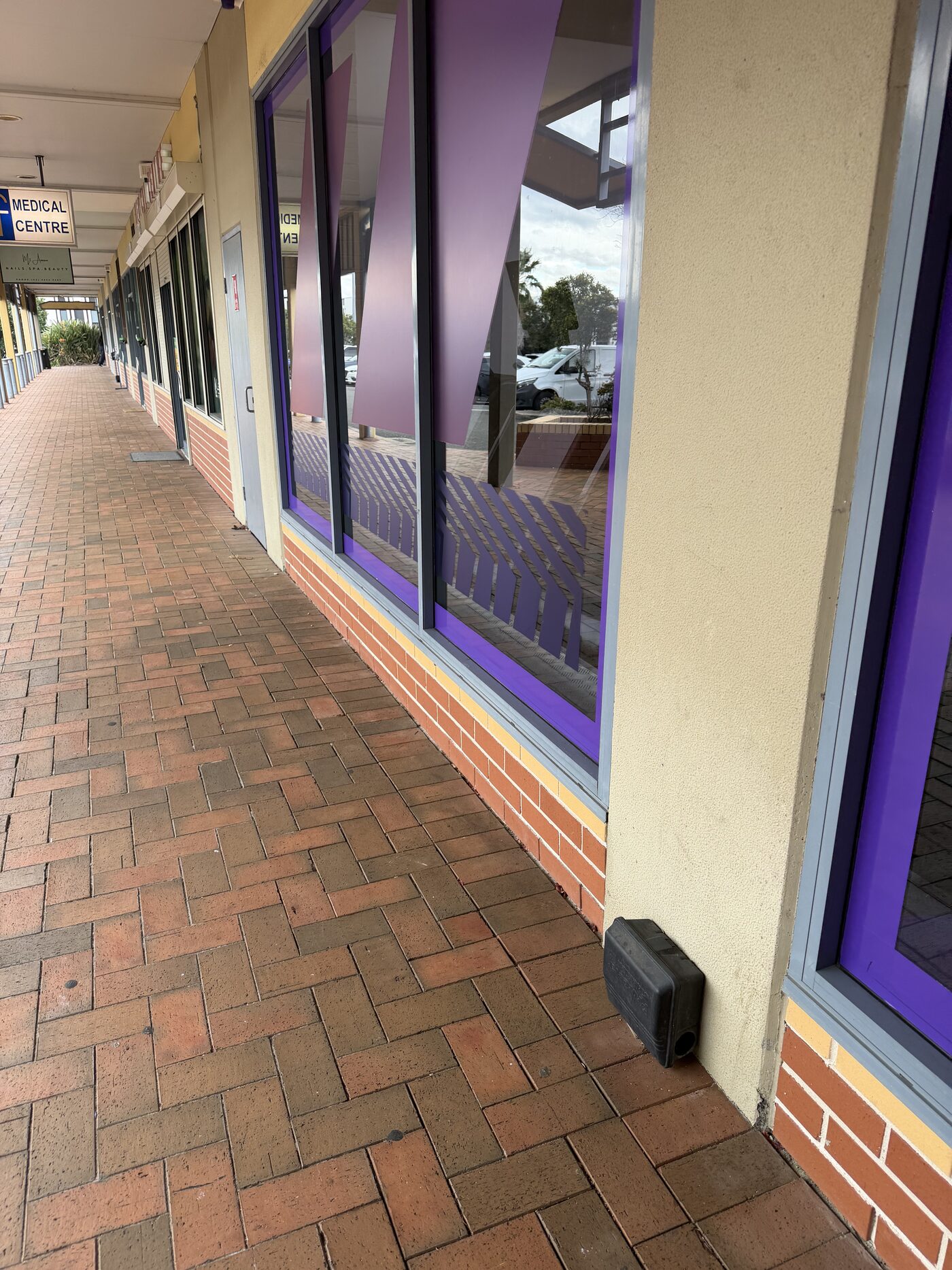 Doctor Pesty bait station placed outside a commercial medical centre and retail strip