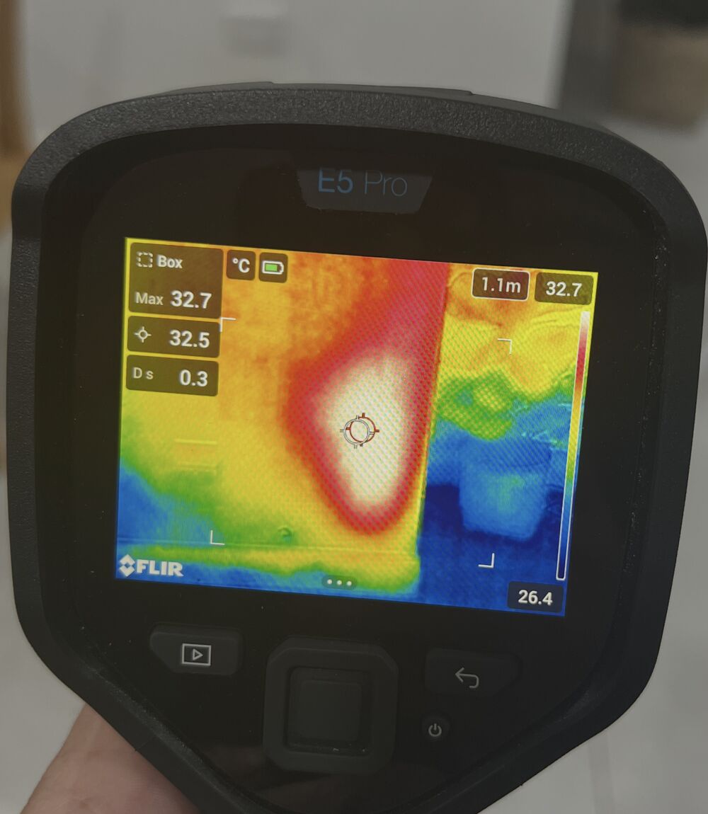 Thermal imaging used to locate active termite activity inside a wall cavity